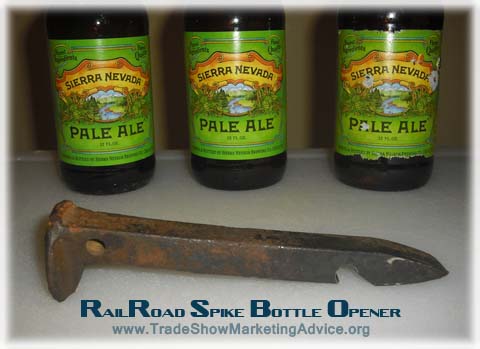 effective promotional product example - a railroad spike bottle opener